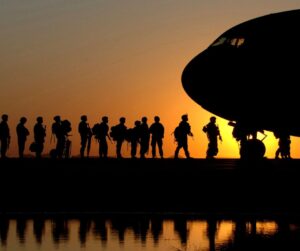 Soldiers going to a plane