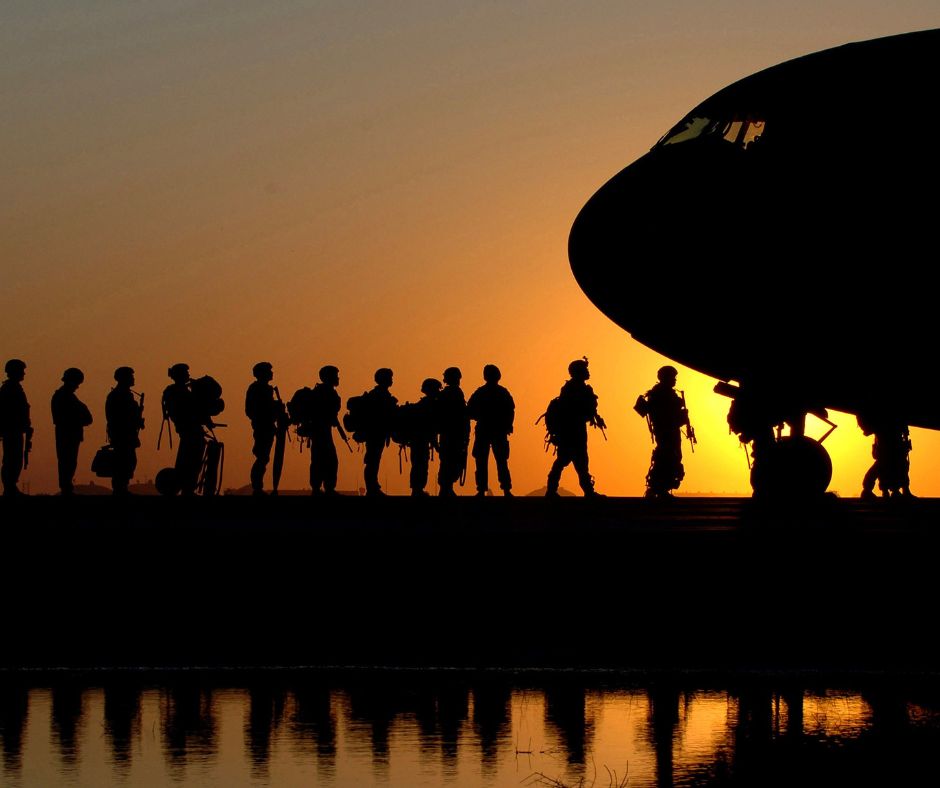 Soldiers boarding a plane